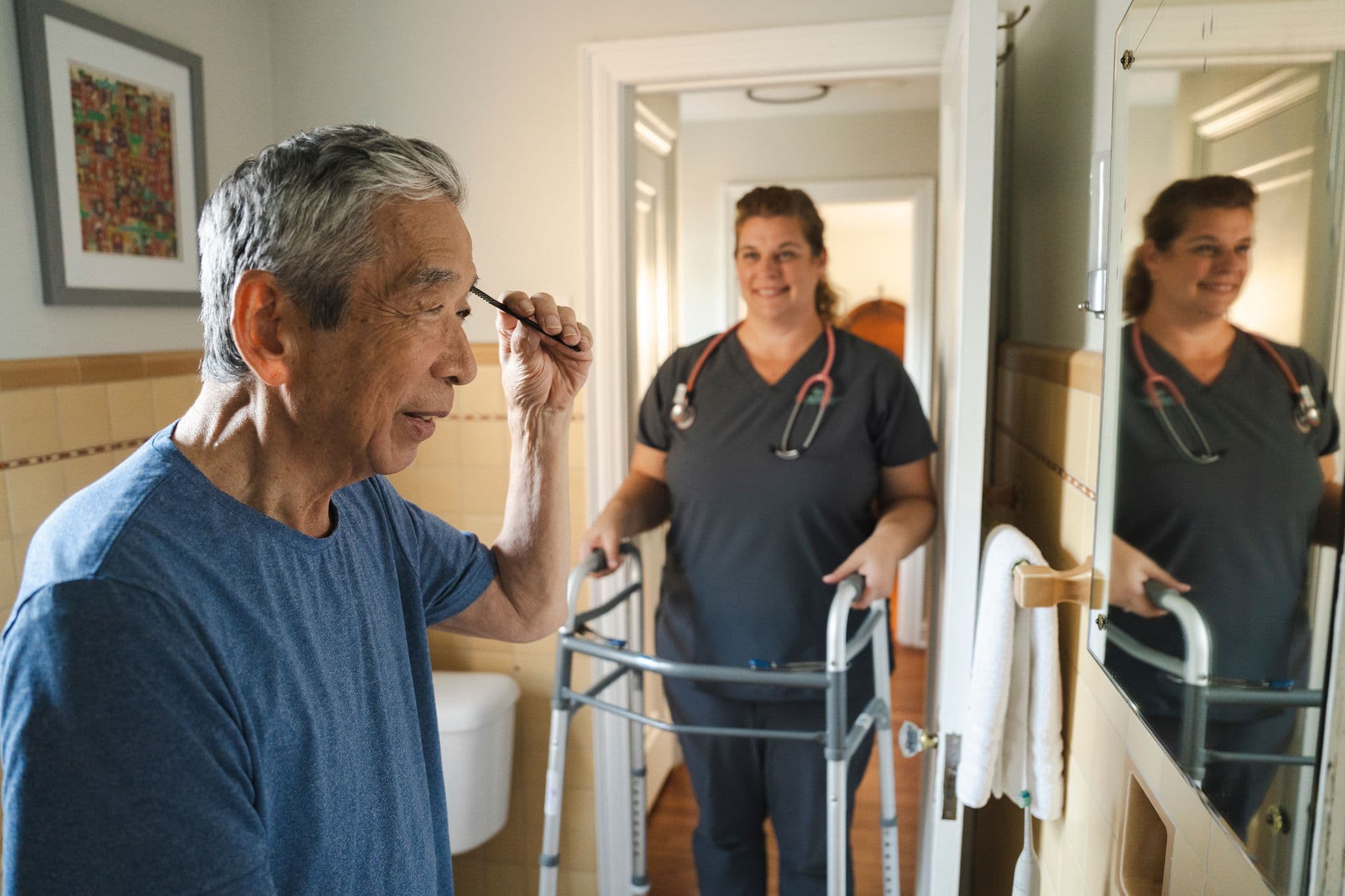 A Commonheart Home Health nurse bringing a patient his walker